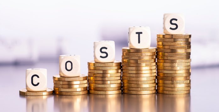 Dice spelling cost with each letter ascending on columns of coins